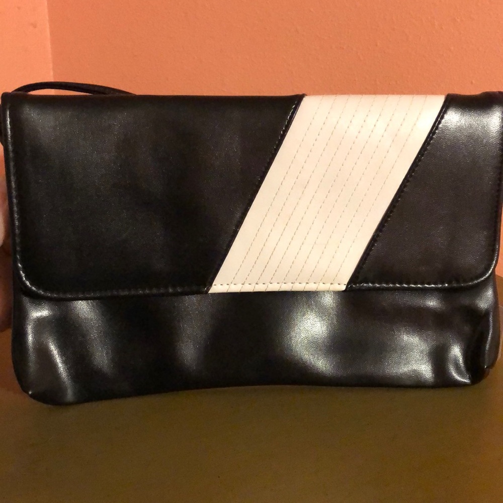 Black purse with white stripes
